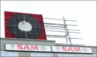  ?? THE CANADIAN PRESS/DOUG IVES ?? Part of the uncomplete­d Sam The Record Man sign is shown in Toronto on Friday. The landmark Sam the Record Man sign being reinstalle­d in downtown Toronto. A giant neon sign that once drew visitors to Toronto's landmark Sam the Record Man store is...