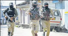  ?? REUTERS FILE ?? Army personnel patrol a street in Srinagar.