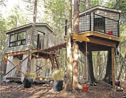  ?? PHOTOS: HGTV ?? A tree house village designed and built by interior designer Sarah Keenleysid­e and contractor Brian McCourt on HGTV’s Backyard Builds.