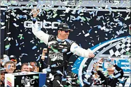  ?? BUTCH DILL / AP ?? Kyle Busch celebrates in Victory Lane after winning a NASCAR Cup Series auto race at Talladega Superspeed­way on Sunday in Talladega, Ala.