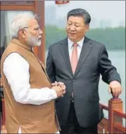  ?? AFP ?? ▪ Prime Minister Narendra Modi with Chinese President Xi Jinping during a round of informal talks between the two in Wuhan province of China on Saturday.