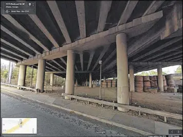  ?? GOOGLE MAPS STREET VIEW ?? This November image from Google Maps Street View shows the underneath of I-85 where the interstate passes over Piedmont Road, looking to the northeast. The section that collapsed is above the stacked coils of material seen at right.