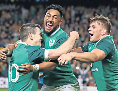  ??  ?? Let the party begin: (from left) Jonathan Sexton, Bundee Aki and Jordi Murphy celebrate Ireland’s first three-match Test series victory in Australia following their success in Sydney