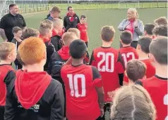  ??  ?? All ears MSP Christina Mckelvie addresses players and coaches at Hamilton Phoenix Boys’ Club