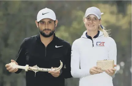  ??  ?? 2 Alexander Levy of France and Jenny Haglund of Sweden with the winners’ prizes after the final round of the Trophee Hassan II at Royal Golf Dar Es Salam.