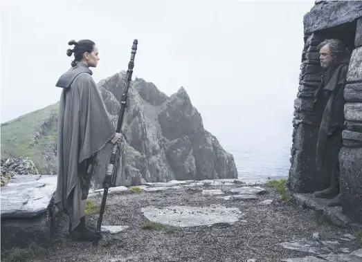  ?? Pictures: LUCASFILM LTD ?? Rey (Daisy Ridley) confronts Luke Skywalker (Mark Hamill) in a scene from Star Wars: The Last Jedi, Below: Adam Driver as Kylo Ren