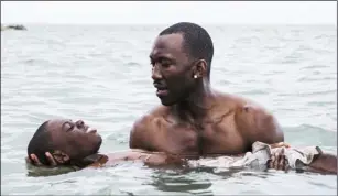  ??  ?? Alex Hibbert and Mahershala Ali in Moonlight (Saturday, Channel 4, 11.20p.m.)