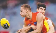 ?? Picture: AAP IMAGE ?? Will Brodie offloads in the Suns’ loss.