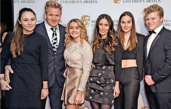  ??  ?? Family values: Ramsay with, from left, Megan, Matilda, wife Tana, and twins Holly and Jack at the 2016 Bafta Children’s Awards