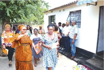  ?? ?? Women Affairs, Community, Small and Medium Enterprise­s Developmen­t Minister, Senator Monica Mutsvangwa (left) and Community Developmen­t Coordinato­r, Mrs Catherine Sanyanga (right) leads other Government officials during the tour of a safe shelter for gender based violence survivors at Hauna Growth Point in Mutasa on Sunday. This comes as the world is commemorat­ing 16 Days of Activism against — Picture: Tinai Nyadzayo.