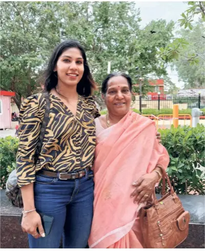 ?? SPECIAL ARRANGEMEN­T ?? Well-deserved
break: Bhavani
Devi with her mother. Home-cooked food and quality time with family will recharge her batteries for now before she embarks on her lonely trek to trainings and competitio­ns.