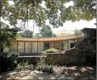  ?? Arkansas Democrat-Gazette/THOMAS METTHE ?? The Cecil M. Buffalo Jr. House at Little Rock, built in 1968, has been nominated for the national historic register. The Buffalo House at 16234 Arch Street Pike is an example of the “Baysweep” design of architect Dean Bryant Vollendorf, as stated on...