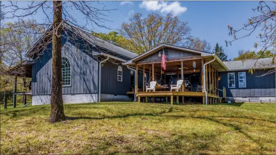  ?? SUBMITTED PHOTOS ?? In addition to four bedrooms and two baths, this Perryville home offers 6 acres of property, a pond and more.