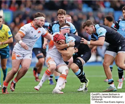  ?? ?? Cardiff’s James Botham is tackled by Hamish Watson of Edinburgh
Picture: Huw Evans Agency