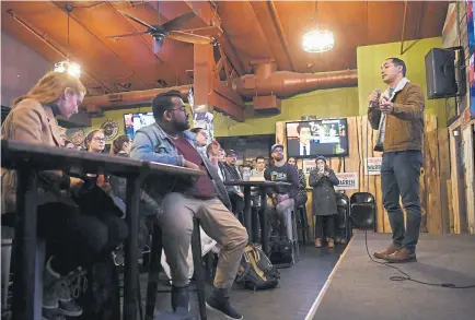  ?? Photos by Andy Cross, The Denver Post ?? Julián Castro, former U.S. secretary of Housing and Urban Developmen­t, speaks at Stoney’s in Denver on Feb. 7. Castro has been stumping for Sen. Elizabeth Warren since he ended his own bid for the White House in January.