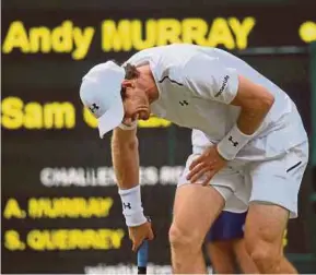  ?? REUTERS PIC ?? Andy Murray reacts to his injury in his match against Sam Querrey yesterday.