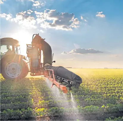  ??  ?? A tractor spraying pesticide, but how many may be affected by new EU regulation­s?