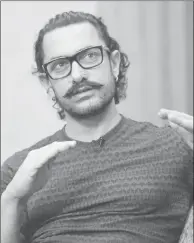  ?? Reuters pic — ?? Actor Aamir Khan speaks during an interview in Singapore, October 2, 2017.