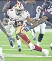  ?? ERIC CHRISTIAN SMITH — THE ASSOCIATED PRESS ?? 49ers running back Jeremy McNichols (33) might have a better shot at a roster spot with Joe Williams injured.