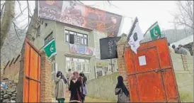  ?? WASEEM ANDRABI / HT ?? House of suicide attacker Fardeen in Kashmir’s Tral is adorned with his posters.