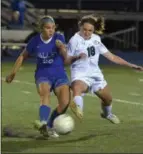  ?? PETE BANNAN — DIGITAL FIRST MEDIA ?? Great Valley’s Emily Mansfield, left, dribbles ahead of Ridley’s Shea McIntyre Tuesday night in a District 1 Class 4A playoff game between the teams.