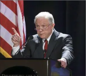  ?? ANDY BARRON — THE RENO GAZETTE-JOURNAL VIA AP ?? U.S. Attorney General Jefferson Sessions talks about immigratio­n at the NASRO School Safety Conference at the Peppermill Resort on Monday in Reno, Nev.