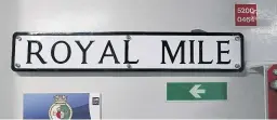  ?? Picture: PA . ?? A sign for the Royal Mile in a corridor on board HMS Queen Elizabeth.