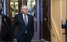  ?? Jabin Botsford/The Washington Post ?? New Jersey Sen. Bob Menendez heads to his office after a vote on Capitol Hill. His longtime political career is on the line, as is his freedom, with a federal corruption trial starting Monday in Manhattan.