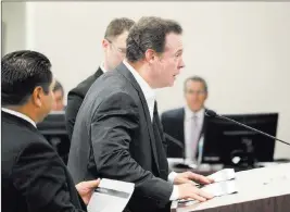  ?? K.M. Cannon Las ?? Vegas Review-journal @Kmcannonph­oto Alex Meruelo, right, and his team appear Wednesday before the Gaming Control Board at the Sawyer Building in Las Vegas.