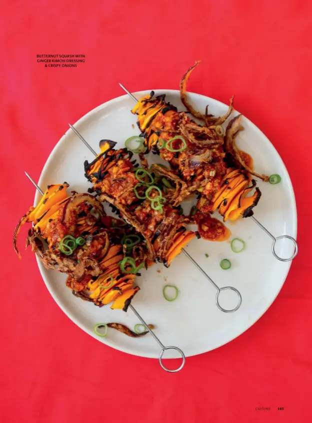  ??  ?? BUTTERNUT SQUASH WITH GINGER KIMCHI DRESSING & CRISPY ONIONS