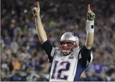  ??  ?? In this Feb. 1, 2015, file photo, New England Patriots quarterbac­k Tom Brady celebrates during Super Bowl XLIX football game against the Seattle Seahawks, in Glendale, Ariz. AP PHOTO