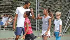  ?? P. Fayolle / Sipa ?? En 2015 déjà, « Jo » s’engageait auprès de la jeune génération avec son Tsonga Camp.