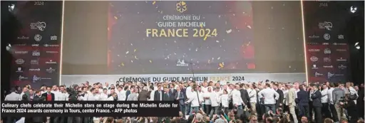  ?? ?? Culinary chefs celebrate their Michelin stars on stage during the Michelin Guide for France 2024 awards ceremony in Tours, center France. - AFP photos
