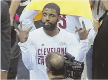  ?? AP PHOTO ?? HANG LOOSE: Kyrie Irving gestures after the Cavs beat the Warriors in Game 4. The teams play Game 5 tonight in Oakland.