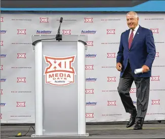  ?? LM OTERO/AP 2021 ?? Big 12 Commission­er Bob Bowlsby, seen at Big 12 football media days last July in Arlington, Texas, announced his retirement earlier this year with plans to stay on until his replacemen­t is in place.