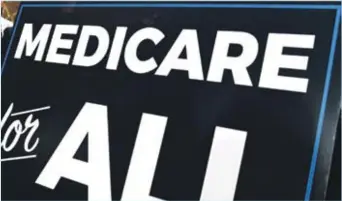  ?? / AP ?? La foto de archivo muestra un cartel del programa durante una conferenci­a de prensa para volver a presentar una propuesta de ley llamada “Medicare para todos”.