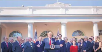  ?? PABLO MARTINEZ MONSIVAIS/ASSOCIATED PRESS ?? President Donald Trump speaks as he announces a revamped North American free trade deal, in the Rose Garden of the White House in Washington last Monday.