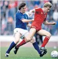  ??  ?? Cooper (right) being tackled by Glasgow Rangers’ Colin Mcadam during the 1982 Scottish FA Cup Final at Hampden Park, Glasgow, which Aberdeen won 4-1 after extra time