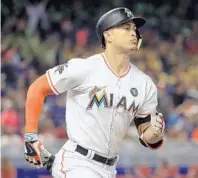  ?? MIKE EHRMANN/GETTY IMAGES ?? Giancarlo Stanton homered for the third time in the first inning in the Philadelph­ia series onWednesda­y, but in the rest of the game things did not go well for Miami.