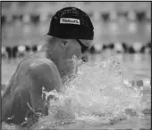  ?? Associated Press ?? WINNING GOLD Britain’s Adam Peaty swims in the men’s 100m breaststro­ke final at the World Swimming Championsh­ips in Gwangju, South Korea, on Monday.