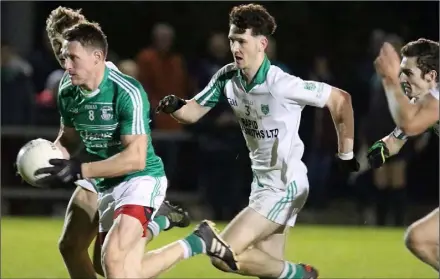  ??  ?? Brendan Travers on the move for Naomh Eanna with Oisín Foley of Crossabeg-Ballymurn on his heels.