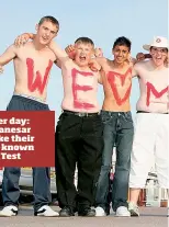  ??  ?? Red letter day: Monty Panesar fans make their feelings known before a Test