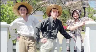  ?? CAROL ROLF/CONTRIBUTI­NG PHOTOGRAPH­ER ?? Ready for their upcoming performanc­es in The Adventures of Tom Sawyer the Broadway Musical are Will Porter, from left, who plays Huckleberr­y “Huck” Finn; Luke Foster, who plays Tom Sawyer; and Annslee Clay, who plays Becky Thatcher.