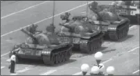  ?? AP file/jeff WIDENER ?? A lone man blocks a column of tanks on Beijing’s Changan Boulevard near Tiananmen Square on June 4, 1989.