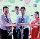  ??  ?? Deputy General Manager Operations Damith Malawithan­thila inaugurate­s the newly-opened PLC Aluthgama branch