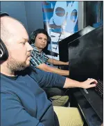  ?? Picture: EUGENE COETZEE ?? READY FOR COMBAT: Battle game fans Tarquin Accum, back, and Game On store owner Nic Gunston compete in a ‘Fight Night’ tournament at the Game On lounge