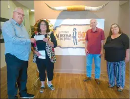  ?? HERALD photo/Roger Cline ?? Last week, a special donation was made to the Heritage Museum. Pictured at the check presentati­on are: Roy Worthy, Museum Executive Director Tammy Schrecengo­st, Museum Board Treasurer James Johnston, Museum Executive Assistant Cheryl Joy.