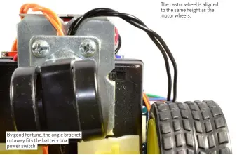  ??  ?? By good fortune, the angle bracket cutaway fits the battery box power switch. The castor wheel is aligned to the same height as the motor wheels.