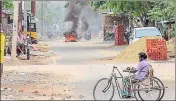  ?? PTI PHOTO ?? Protesters burn tyres to block a road demanding the closure of Vedanta's Sterlite copper unit in Tuticorin on Thursday.