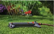  ??  ?? With GARDENA’s Aquazoom Oscillatin­g Sprinklers you don’t have to worry about puddles